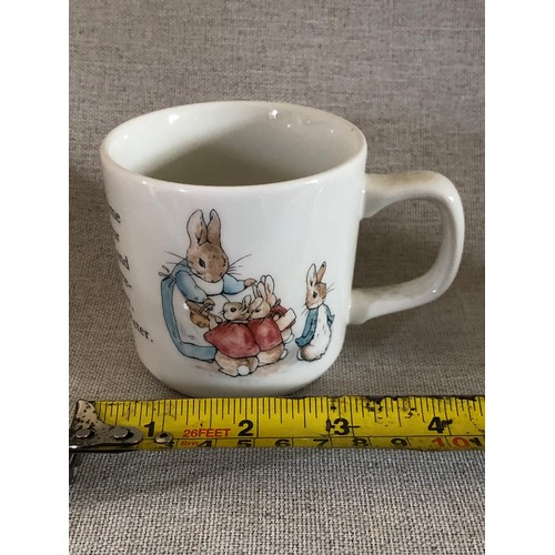 604 - Peter Rabbit child’s mug by Wedgwood.