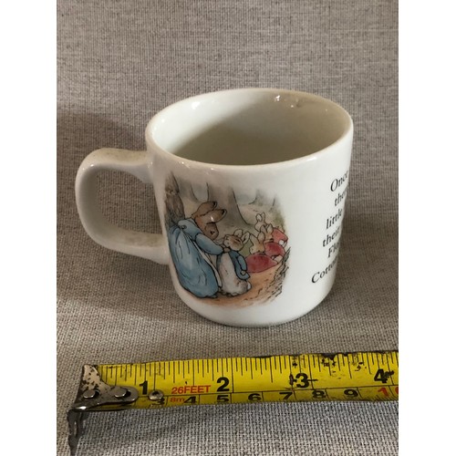 604 - Peter Rabbit child’s mug by Wedgwood.