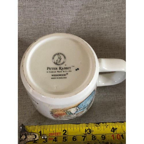 604 - Peter Rabbit child’s mug by Wedgwood.