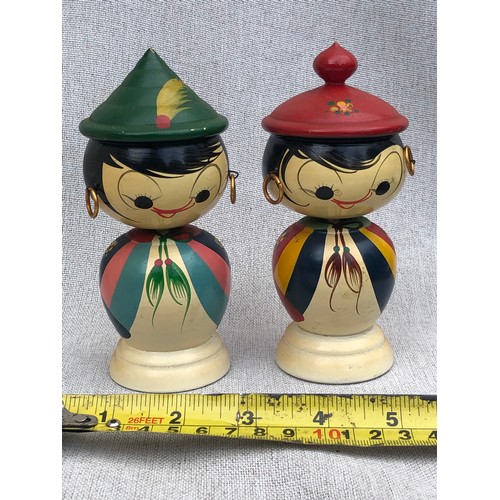 718 - Pair of wobbly head wooden dolls.