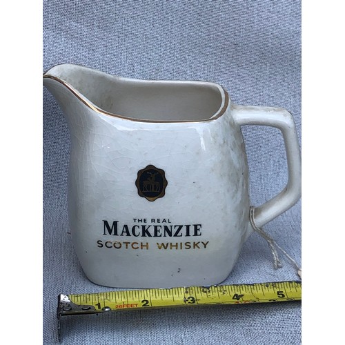 727 - The Real Mackenzie Scotch Whisky jug by Wade.