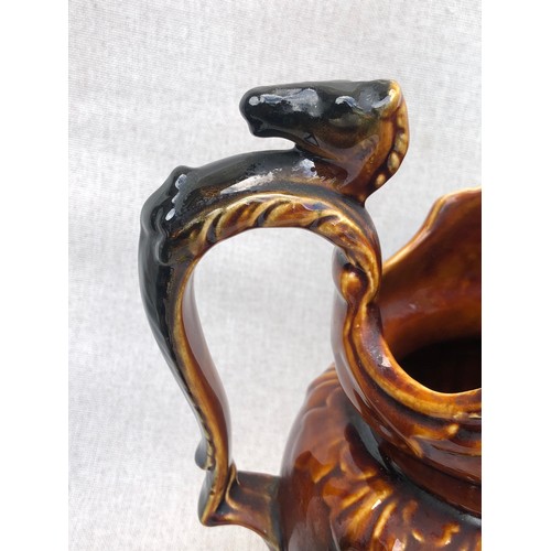 740 - Arthur Woods John Gilpin Horse Head Pitcher treacle glazed relief pattern jug with horse head handle... 