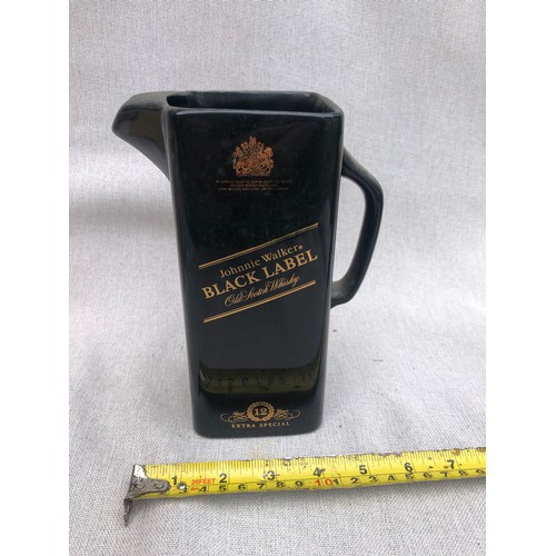 752 - Johnnie Walker Black label old scotch whisky Jug by Wade.