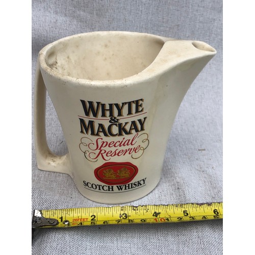 754 - Whyte & MacKay Special reserve scotch whisky jug by Wade