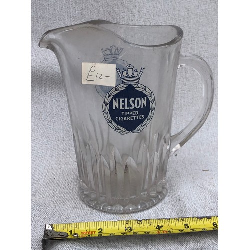 756 - Nelson tipped cigarettes Glass jug