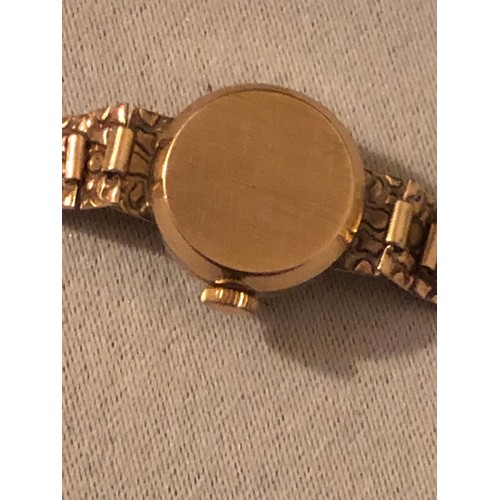 129 - Solid 9ct gold ladies Accurist dress watch. With heart shaped box and certificate