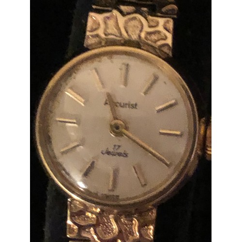 129 - Solid 9ct gold ladies Accurist dress watch. With heart shaped box and certificate