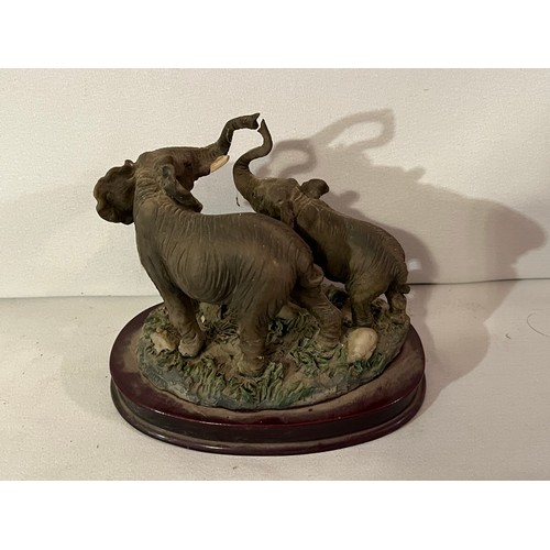 232 - Juliana Elephant figurine. Pair with trunks raised