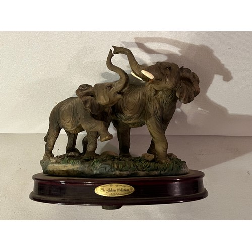 232 - Juliana Elephant figurine. Pair with trunks raised