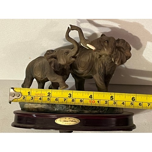 232 - Juliana Elephant figurine. Pair with trunks raised