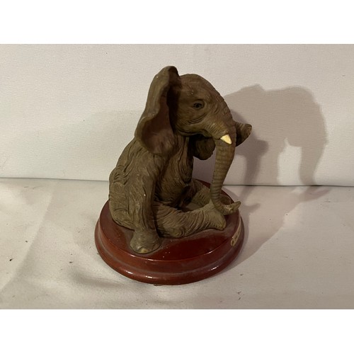 233 - Juliana Elephant figurine. Seated