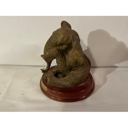 233 - Juliana Elephant figurine. Seated