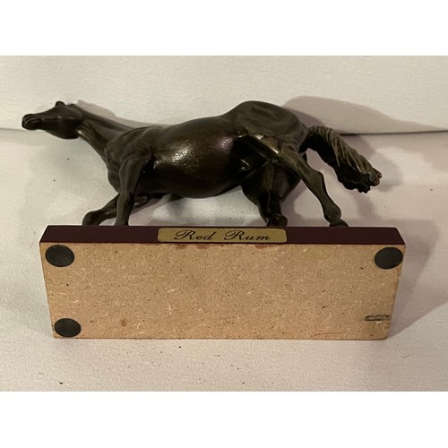 237 - Bronze resin Red Rum racehorse figurine. Ears damaged