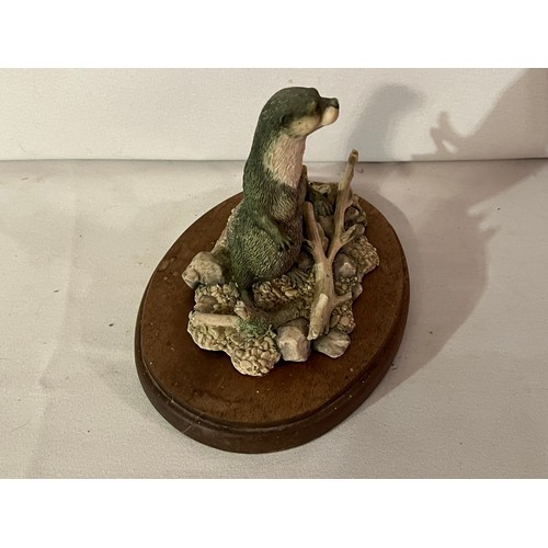 239 - Border Fine Arts Otter figurine by Ray Ayres 1986 with plinth.