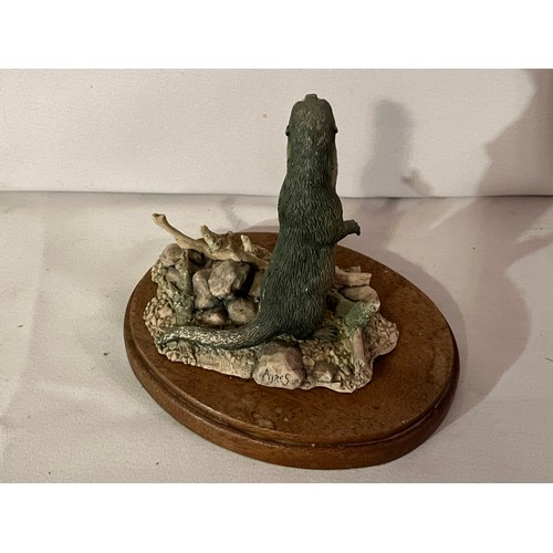 239 - Border Fine Arts Otter figurine by Ray Ayres 1986 with plinth.