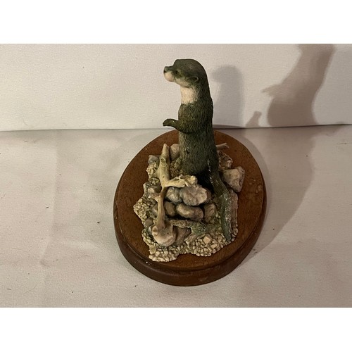 239 - Border Fine Arts Otter figurine by Ray Ayres 1986 with plinth.