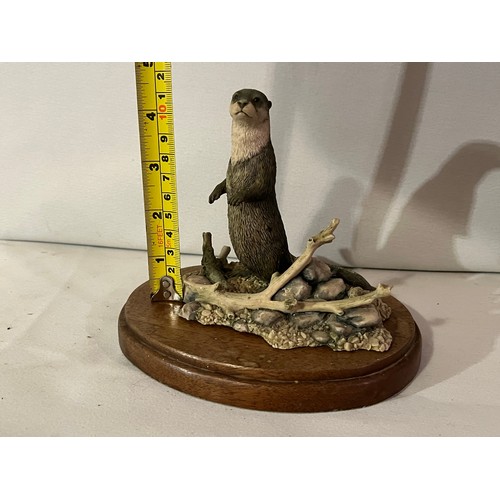 239 - Border Fine Arts Otter figurine by Ray Ayres 1986 with plinth.