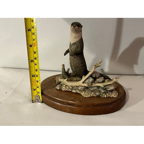 239 - Border Fine Arts Otter figurine by Ray Ayres 1986 with plinth.