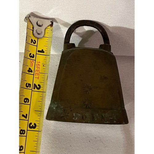 241 - Brass cow or goat bell complete with clanger engraved LOEN