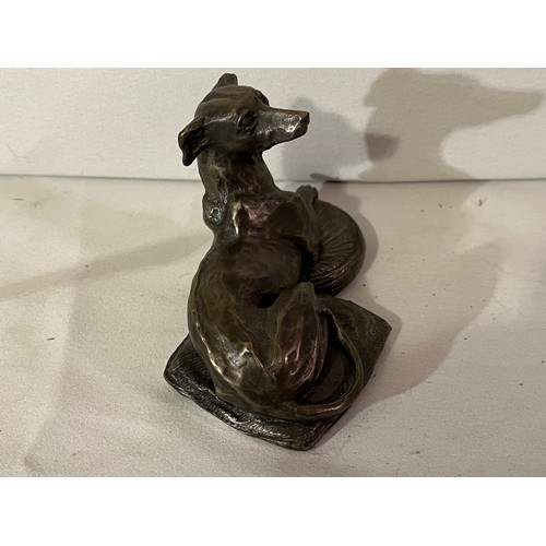 243 - Fiesta bronze resin figurine of a seated Greyhound