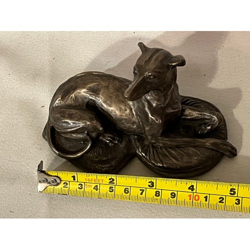 243 - Fiesta bronze resin figurine of a seated Greyhound