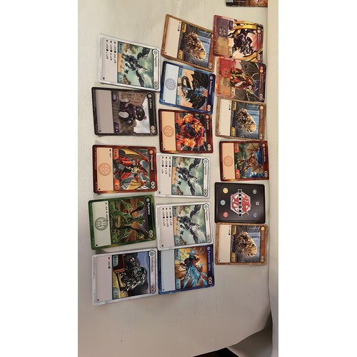 257 - A large collection of Bakugan toys and cards. Very collectable