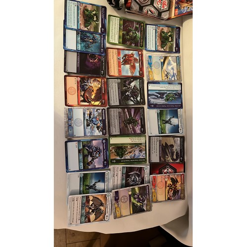 257 - A large collection of Bakugan toys and cards. Very collectable