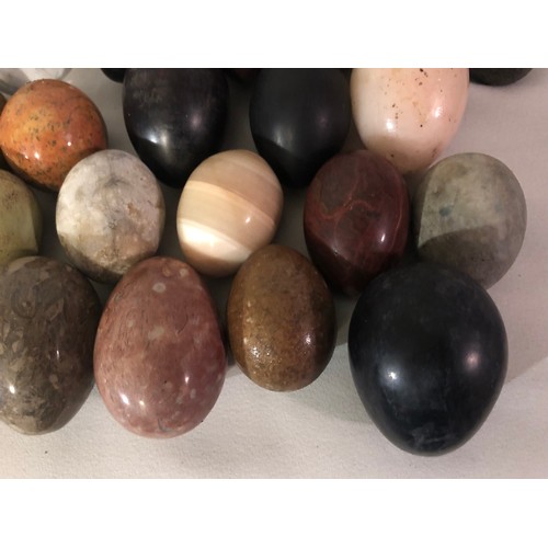 321 - A good collection of rock minera, glass and wooden eggs