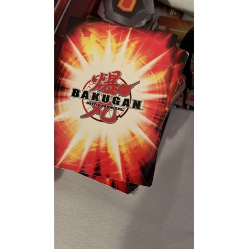 237 - A large collection of Bakugan toys and cards. Very collectable