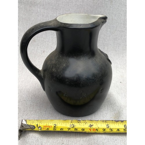 736 - Take courage jug.