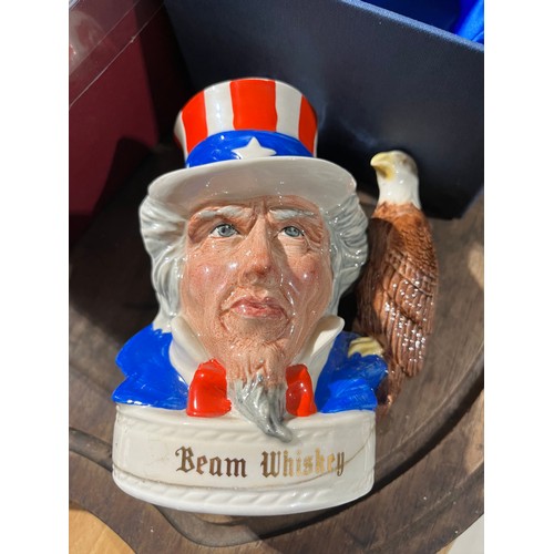 836 - Jim Beam 200ml Samrai Warrior and Uncle Sam toby jugs by Royal Doulton. New in boxes full and sealed