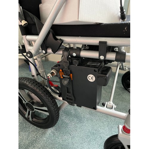 850 - Featherlite 22kg Electric powered wheelchair .  Hardly used with original box. Size 68x28x78