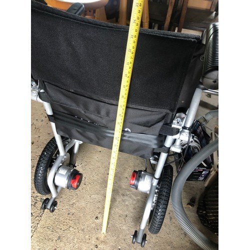 850 - Featherlite 22kg Electric powered wheelchair .  Hardly used with original box. Size 68x28x78