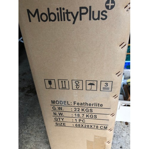 850 - Featherlite 22kg Electric powered wheelchair .  Hardly used with original box. Size 68x28x78