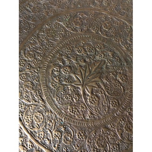 867 - Large brass embossed and pierced wall plaque