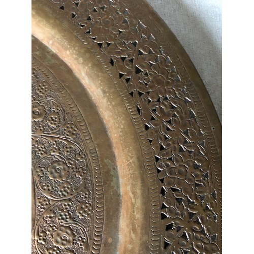 867 - Large brass embossed and pierced wall plaque