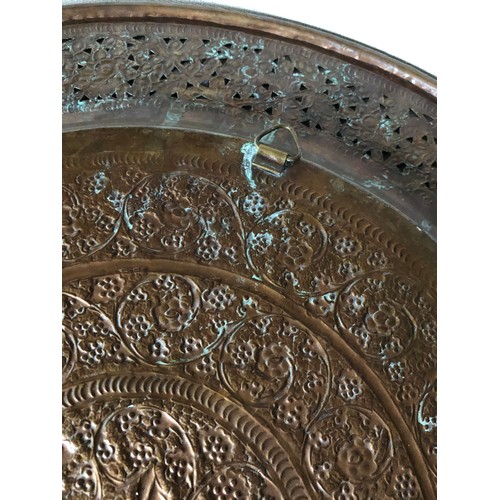 867 - Large brass embossed and pierced wall plaque