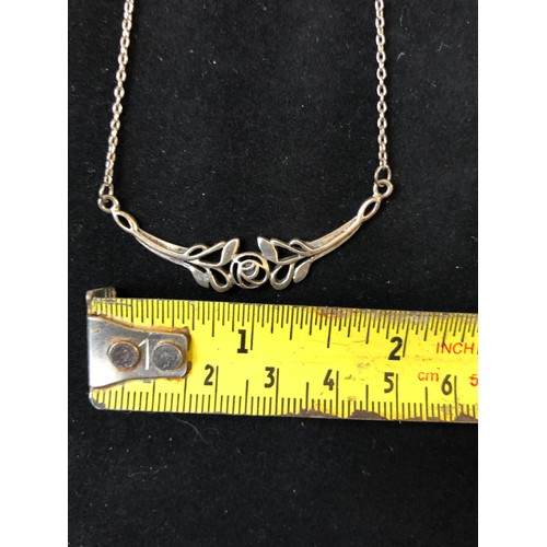 891 - .925 Silver necklace with .925 silver floral design pendant