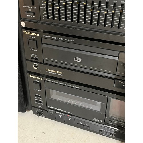 1187 - Technics tower system with deck, CD player, radio, amplifier, graphic equalizer and tape to tape. C/... 