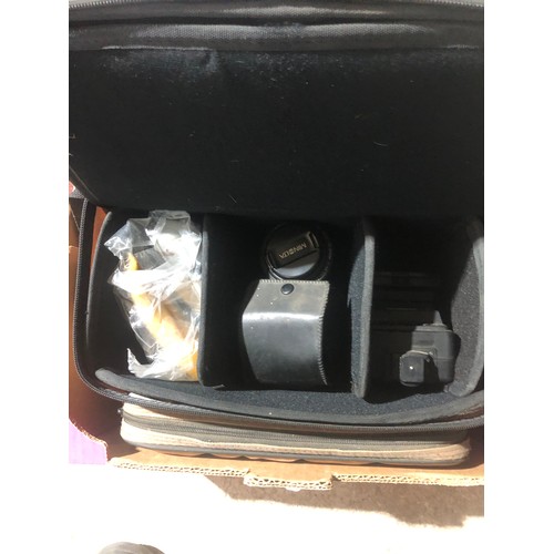 1193 - Box of Camera and video equipment. Incl Sony camcorder, flashes, Centon camera and a Minolta lens.