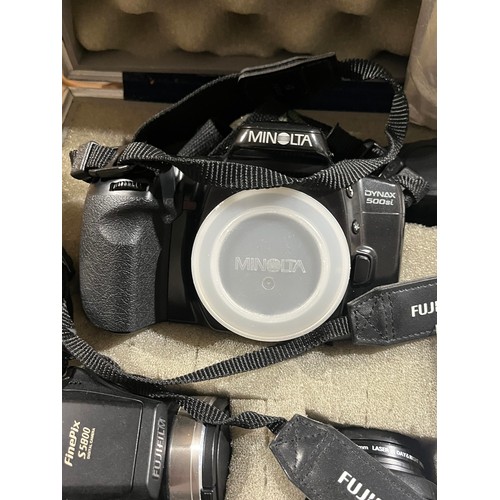 1194 - Minolta camera in case with lenses and other equipment