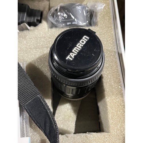 1194 - Minolta camera in case with lenses and other equipment