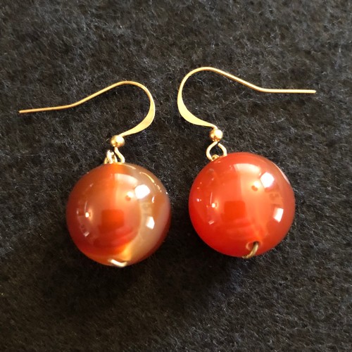 7 - a pair of large red bead earrings