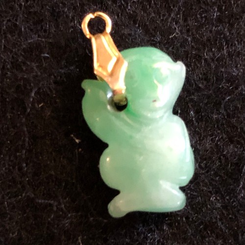 15 - a natural green Jade carved monkey pendant