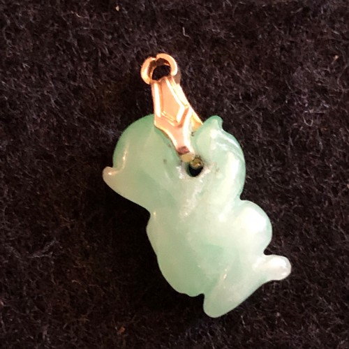 15 - a natural green Jade carved monkey pendant