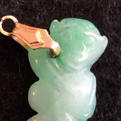 15 - a natural green Jade carved monkey pendant