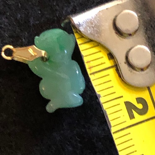 15 - a natural green Jade carved monkey pendant