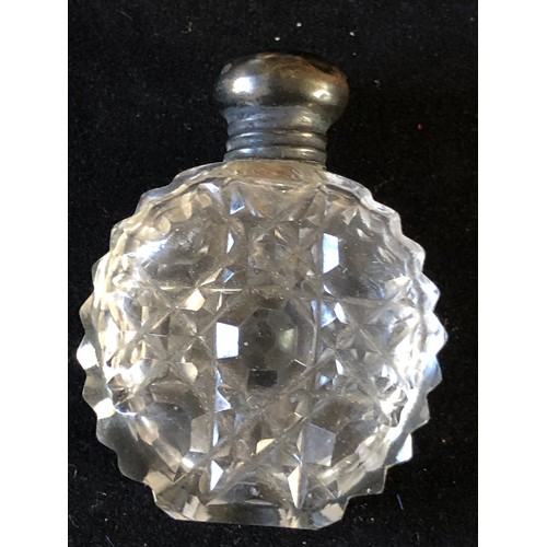 40 - Silver toppeed perfume bottle in cut crystal glass. Hobnail pattern possibly Harvard pattern by Bacc... 