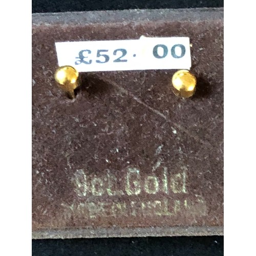 42 - Pair of 9ct gold ear studs