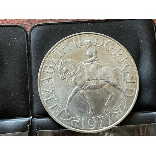 241 - Collection of four Jubilee crowns in wallets, uncirculated Midland bank